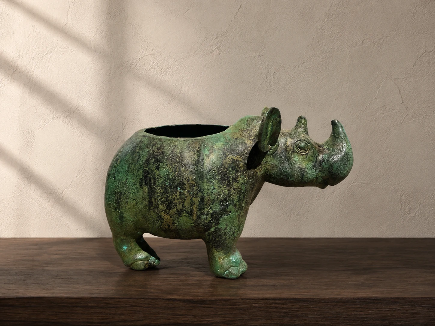 Rhinoceros-Form bronze vessel concept detail showing the animal form and relief