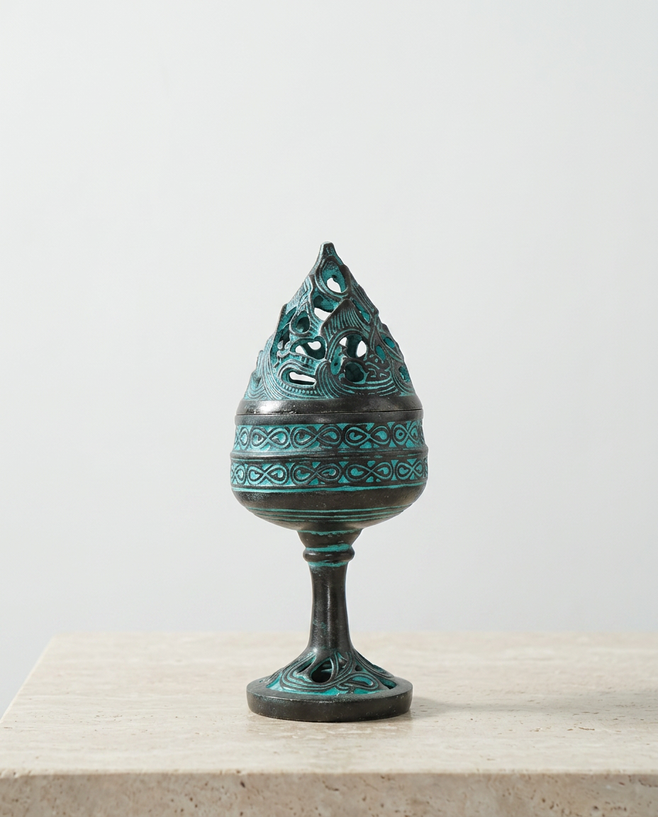 Miniature bronze incense burner with openwork lid and turquoise patina