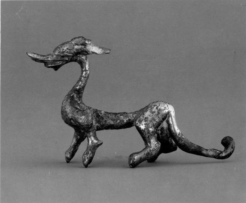 The Met's grayscale photograph of a walking gilt-bronze dragon sculpture, object 30.37.2