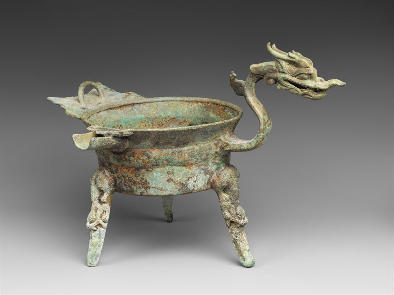 The Met's gilt-bronze tripod vessel with a dragon-head spout, object 2025.829.3